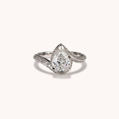 Stunning 1.54 CT Pear Moissanite Engagement Ring with Swirl Design 1